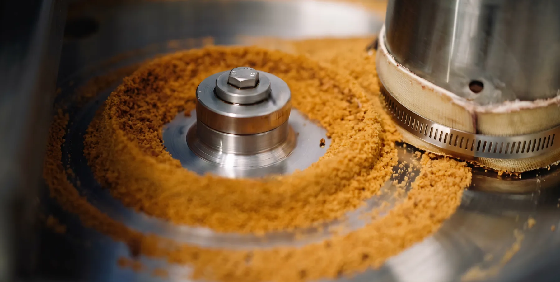 Granulated arenga palm sugar coming off the mill